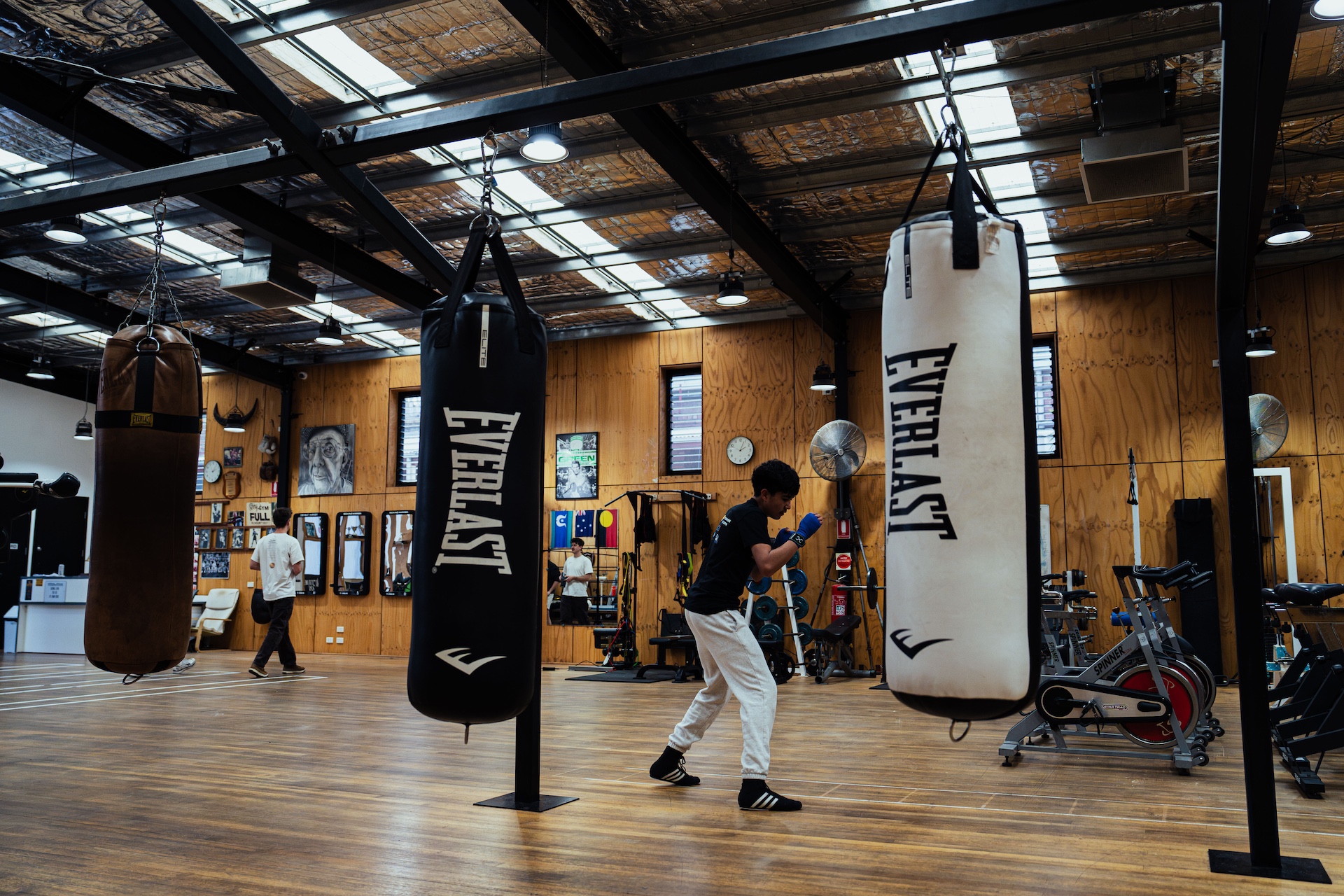 Heavy bags hanging in the Leo Berry's Gym training hall