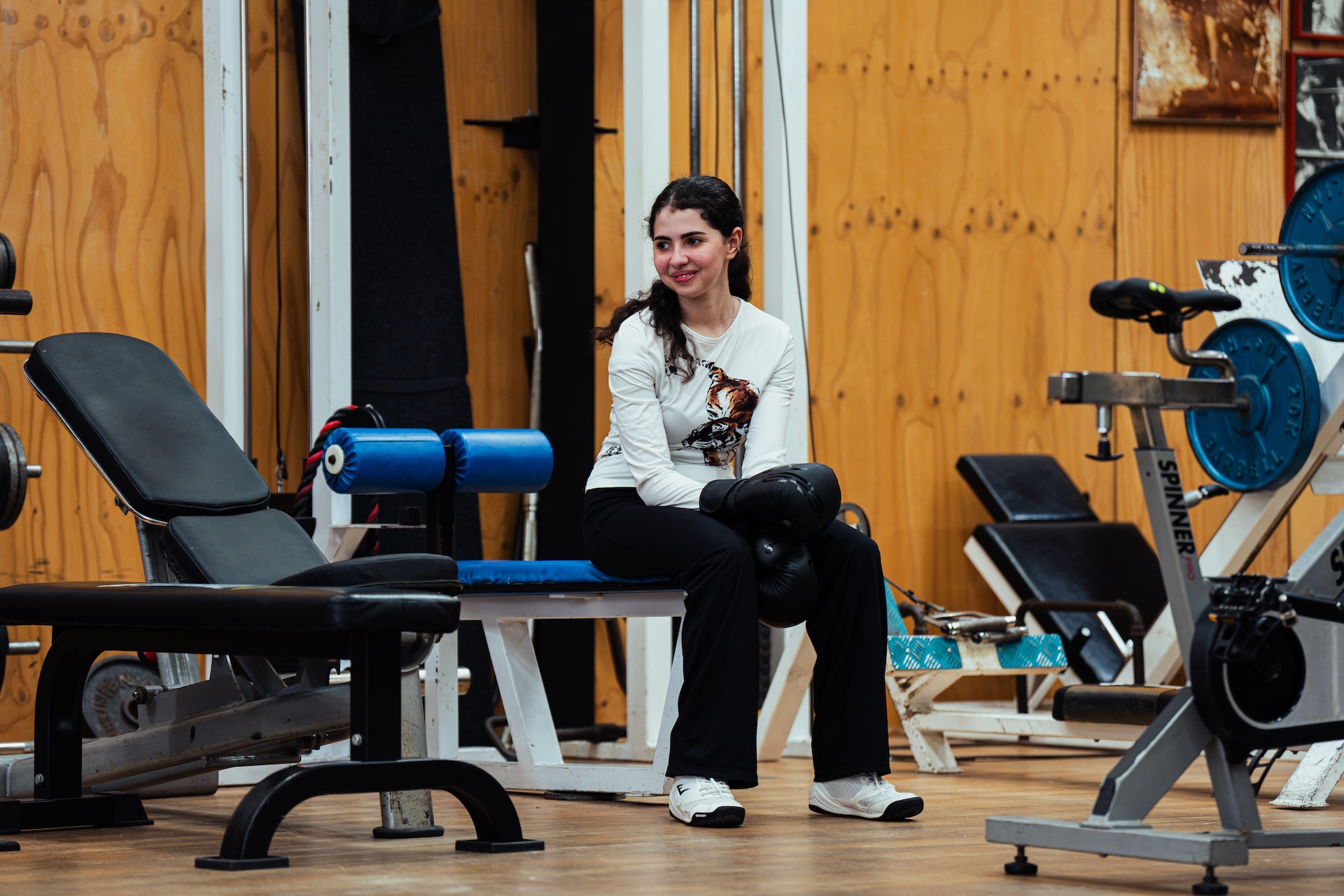 Member resting between circuit stations in the weights area